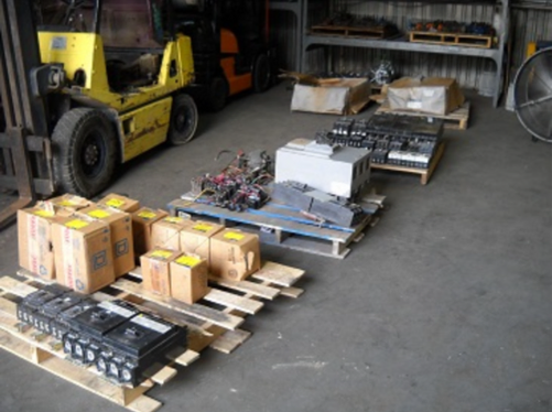 electrical surplus buyer in West Palm Beach FL reviewing organized electrical inventory