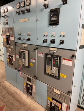 Electrical surplus buyer evaluating switchgear and distribution equipment